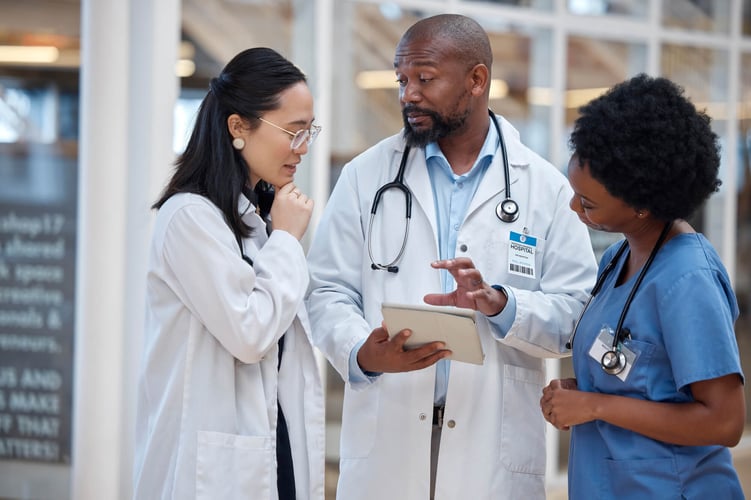 medical team in conversation in a hospital about Migrating to the azure cloud