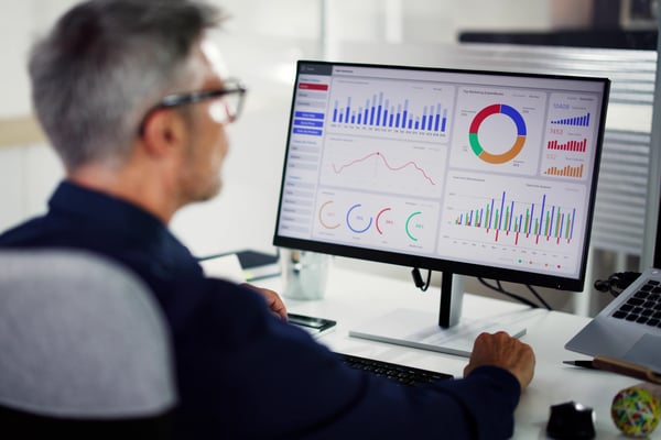 Illustration of a man creating and analyzing power bi dashboard report, symbolizing comprehensive data reporting tools.